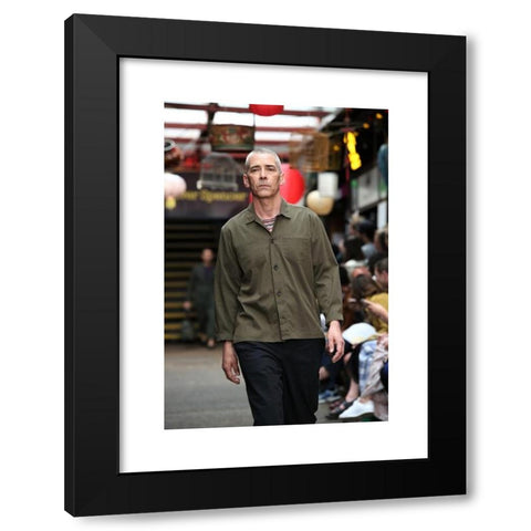 1960's Image Collection by SOPA Images Limited - Black Modern Wood Framed Art Print Titled: A model showcases during a catwalk show at Oliver Spencer show, London Fashion Week Men's.Inspired by Wong Kar-wai’s cinematic masterpiece In the