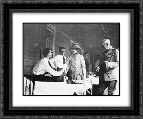 Mrs. Warren G. Harding shaking hands with man seated on bed in military barracks(?) 24x20 Black Ornate Wood Framed Art Print Poster with Double Matting by Library of Congress