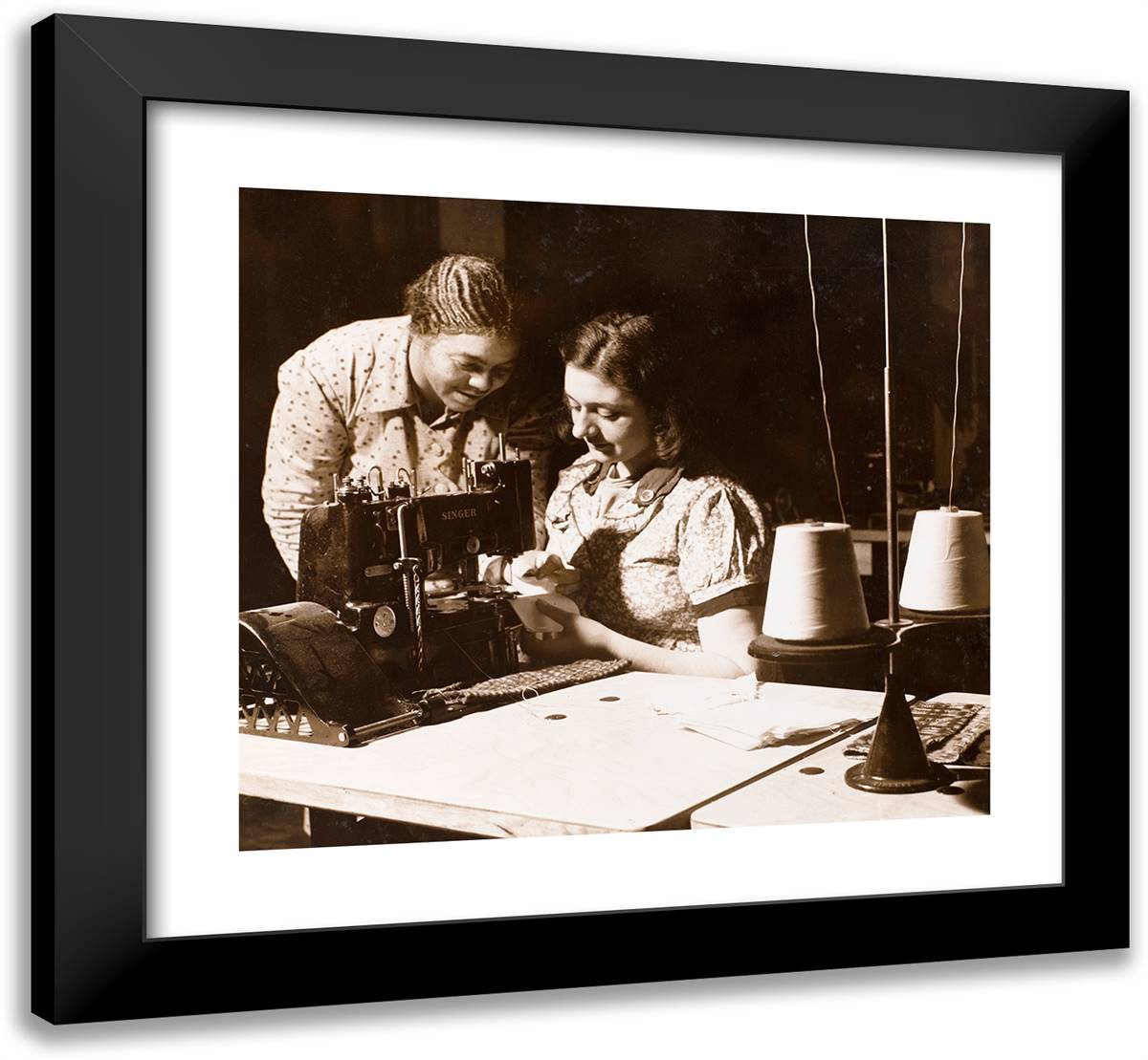 Two Women Use a Sewing Machine 22x20 Black Modern Wood Framed Art Print Poster by Eagle, Arnold