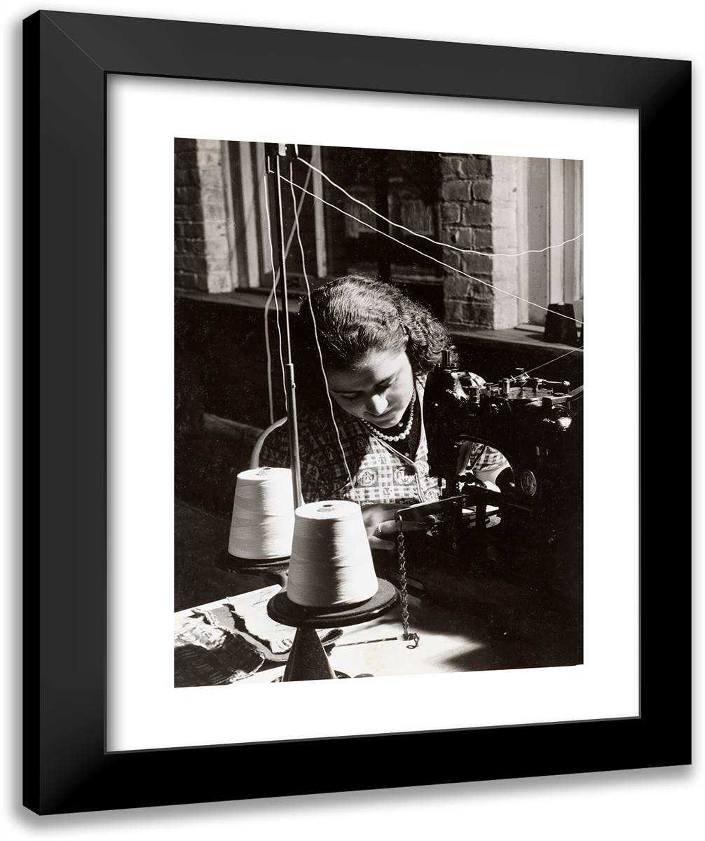 Woman Uses a Sewing Machine Threaded from Two Spools of Whi 20x24 Black Modern Wood Framed Art Print Poster by Eagle, Arnold