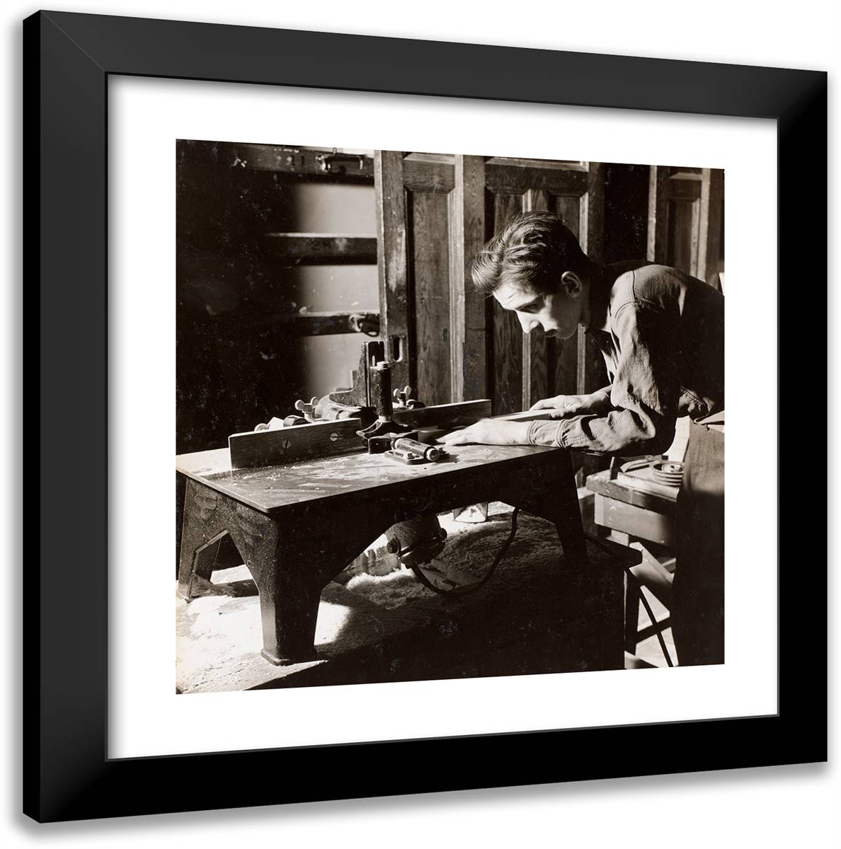 Young Man Leans Over a Woodworking Bench 20x20 Black Modern Wood Framed Art Print Poster by Eagle, Arnold