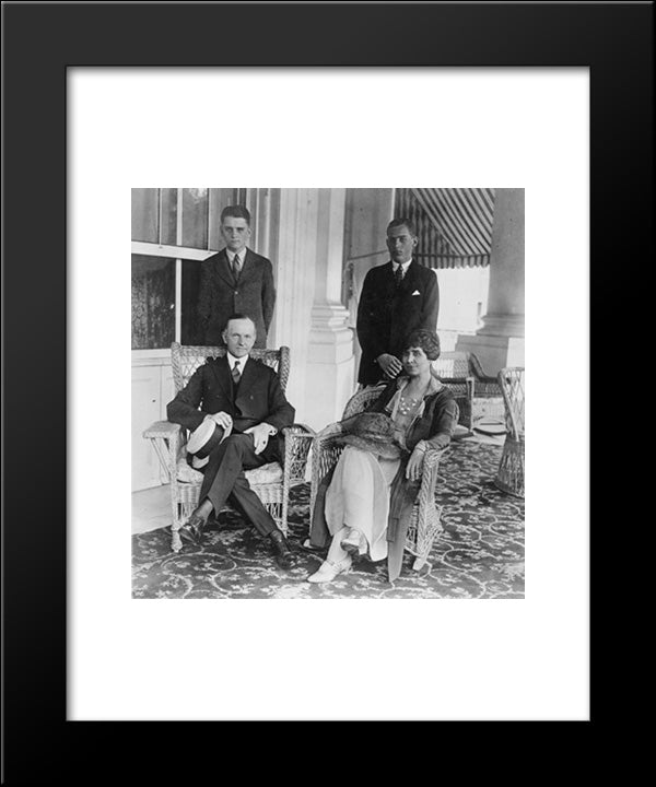 President And Mrs. Coolidge, Full-Length Portraits, Seated On Porch, With Their Two Sons Standing Behind Them 20x24 Black Modern Wood Framed Art Print Poster by Library of Congress