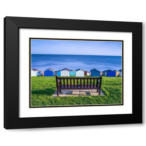 Bench on lawn with beach huts in background Black Modern Wood Framed Art Print with Double Matting by Frank, Assaf