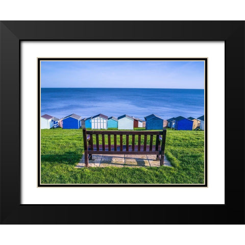 Bench on lawn with beach huts in background Black Modern Wood Framed Art Print with Double Matting by Frank, Assaf