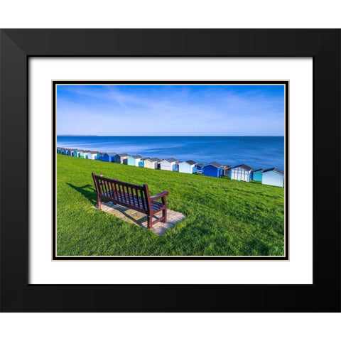 Bench on lawn with beach huts in background Black Modern Wood Framed Art Print with Double Matting by Frank, Assaf