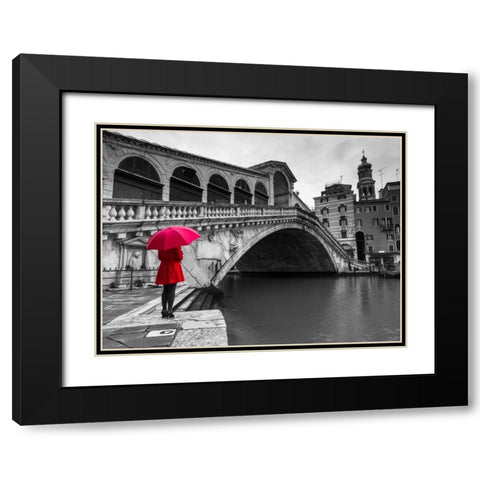 A woman in a red dress holding red umbrella and standing next to the Rialto bridge, Venice, Italy Black Modern Wood Framed Art Print with Double Matting by Frank, Assaf