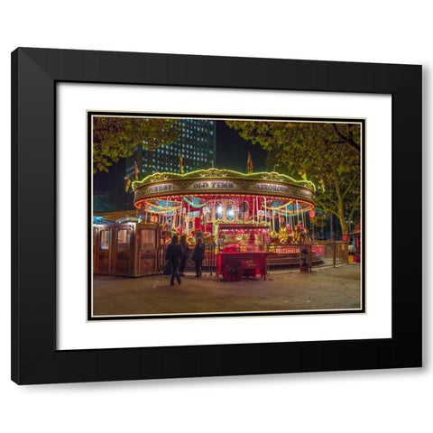 Spinning carousel at night in garden, London, UK Black Modern Wood Framed Art Print with Double Matting by Frank, Assaf