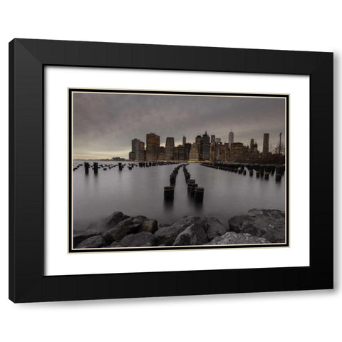 Manhattan skyline with rows of groynes in East river, New York Black Modern Wood Framed Art Print with Double Matting by Frank, Assaf