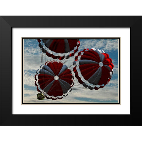 Orion descending by parachute on re-entry to Earth, Project Constellation Black Modern Wood Framed Art Print with Double Matting by NASA