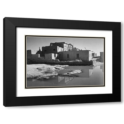 Adobe House with Water in Foreground - Acoma Pueblo, New Mexico - National Parks and Monuments, ca. Black Modern Wood Framed Art Print with Double Matting by Adams, Ansel