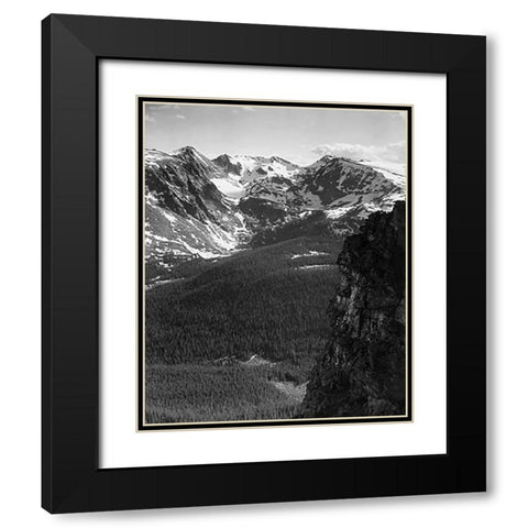 View of snow-capped mountain timbered area below, in Rocky Mountain National Park, Colorado, ca. 194 Black Modern Wood Framed Art Print with Double Matting by Adams, Ansel