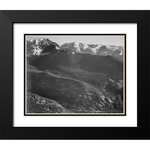 View of wooded hills with mountains in background, in Rocky Mountain National Park, Colorado, ca. 19 Black Modern Wood Framed Art Print with Double Matting by Adams, Ansel