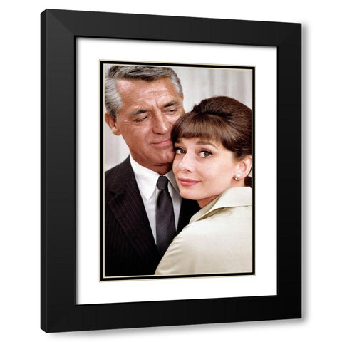 Cary Grant with Audrey Hepburn - Charade Black Modern Wood Framed Art Print with Double Matting by Hollywood Photo Archive