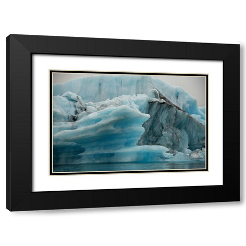 Icebergs from the Jokulsarlon glacier drift in Jokulsarlon lagoon in Iceland Black Modern Wood Framed Art Print with Double Matting by Steve Mohlenkamp