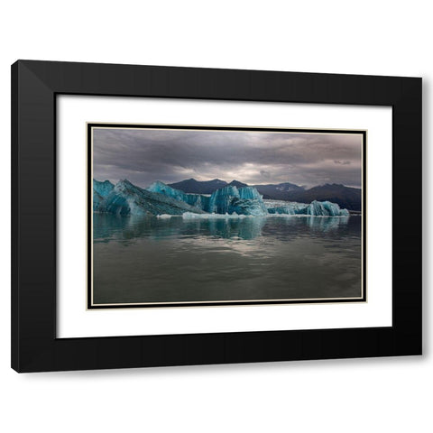 Icebergs from the Jokulsarlon glacier adrift in Jokulsarlon lagoon in Iceland Black Modern Wood Framed Art Print with Double Matting by Steve Mohlenkamp
