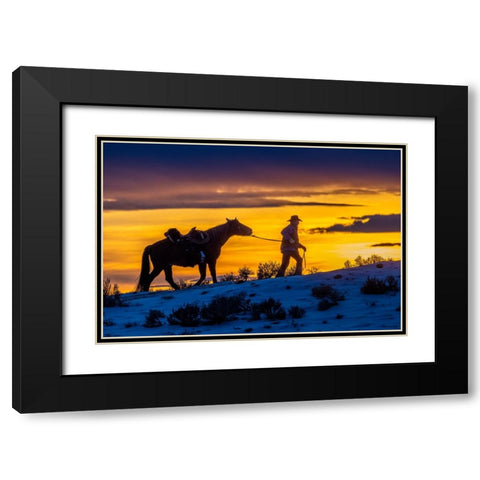 USA- Wyoming. Hideout Horse Ranch- wrangler and horse at sunset. Black Modern Wood Framed Art Print with Double Matting by Looney, Hollice
