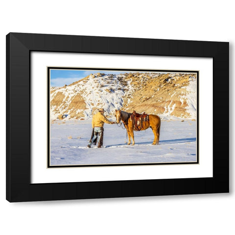 USA- Wyoming. Hideout Horse Ranch- wrangler and horse in snow. Black Modern Wood Framed Art Print with Double Matting by Looney, Hollice