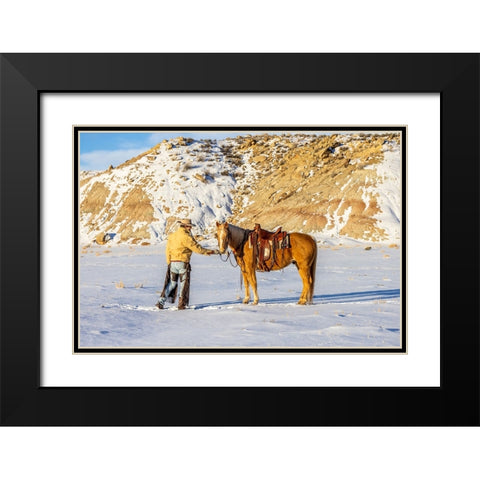 USA- Wyoming. Hideout Horse Ranch- wrangler and horse in snow. Black Modern Wood Framed Art Print with Double Matting by Looney, Hollice