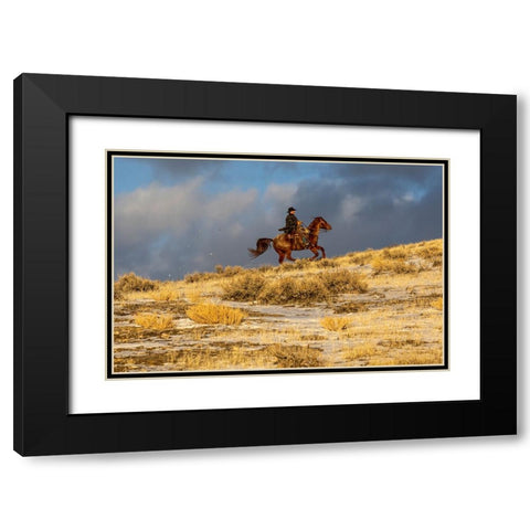 USA- Wyoming. Hideout Horse Ranch- wrangler on horseback in snow. Black Modern Wood Framed Art Print with Double Matting by Looney, Hollice