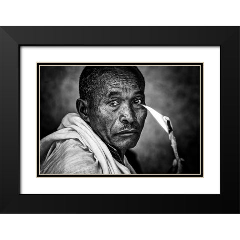 Ethiopian Man Holding A Lit Candle In A Religious Ceremony. Black Modern Wood Framed Art Print with Double Matting by Inazio Kuesta, Joxe