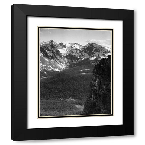 View of snow-capped mountain timbered area below, in Rocky Mountain National Park, Colorado, ca. 194 Black Modern Wood Framed Art Print with Double Matting by Adams, Ansel