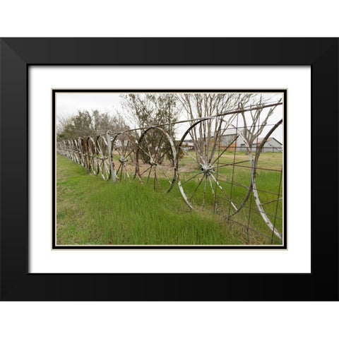 A fence made of wagon wheels near Schulenburg in Fayette County, TX Black Modern Wood Framed Art Print with Double Matting by Highmith, Carol