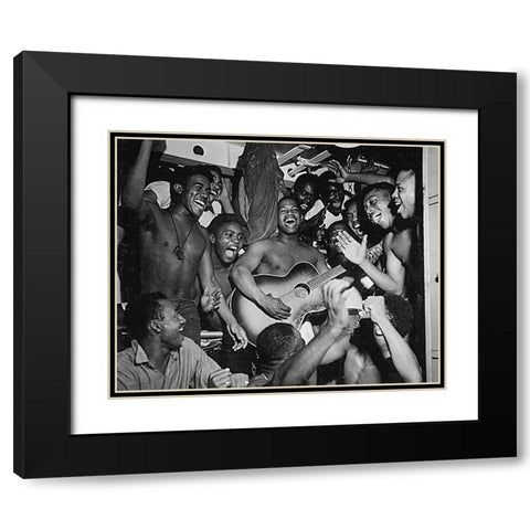 WWII men aboard the U.S.S. Ticonderoga hear the news of Japans surrender Black Modern Wood Framed Art Print with Double Matting by U.S. Archives
