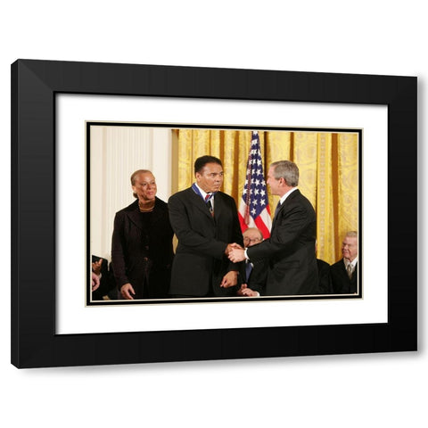President George W. Bush Shakes Hands with Muhammad Ali Black Modern Wood Framed Art Print with Double Matting by U.S. Archives