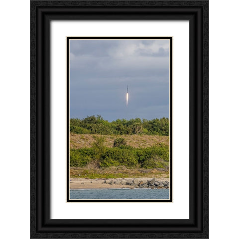 USA-Florida-Port Canaveral-A Space X rocket being launched from Cape Canaveral Black Ornate Wood Framed Art Print with Double Matting by Looney, Hollice
