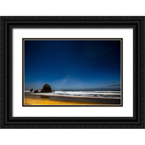 USA- Oregon. Cannon Beach and Haystack Rock stars showing during blue light. Black Ornate Wood Framed Art Print with Double Matting by Gulin, Darrell