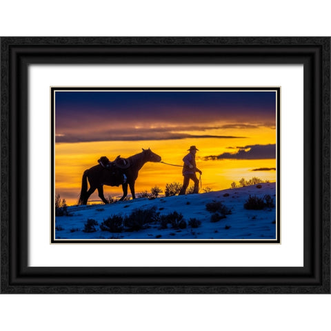USA- Wyoming. Hideout Horse Ranch- wrangler and horse at sunset. Black Ornate Wood Framed Art Print with Double Matting by Looney, Hollice