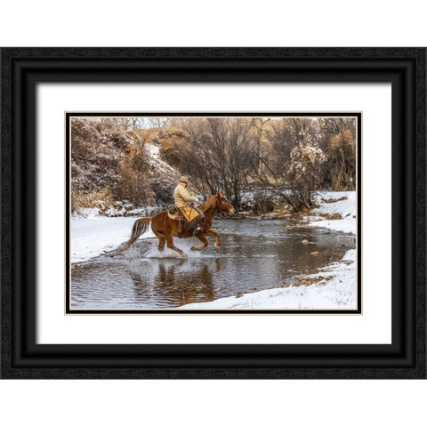 USA- Wyoming. Hideout Horse Ranch- wrangler crossing the stream on horseback. Black Ornate Wood Framed Art Print with Double Matting by Looney, Hollice