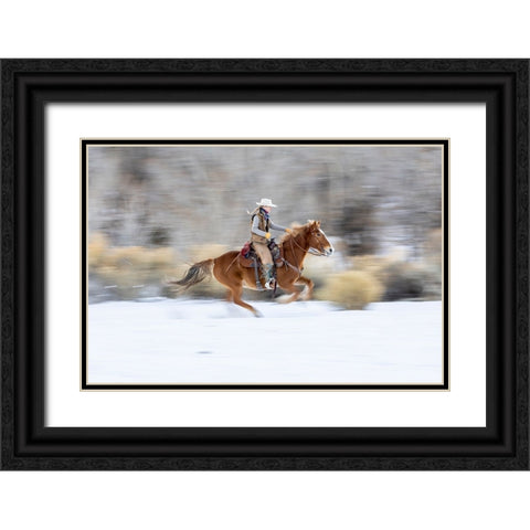 USA- Wyoming. Hideout Horse Ranch- wrangler on horseback in snow. Black Ornate Wood Framed Art Print with Double Matting by Looney, Hollice