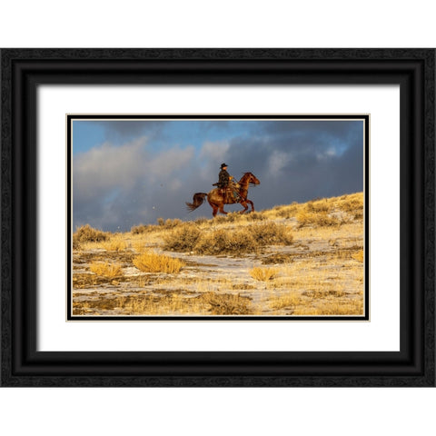 USA- Wyoming. Hideout Horse Ranch- wrangler on horseback in snow. Black Ornate Wood Framed Art Print with Double Matting by Looney, Hollice