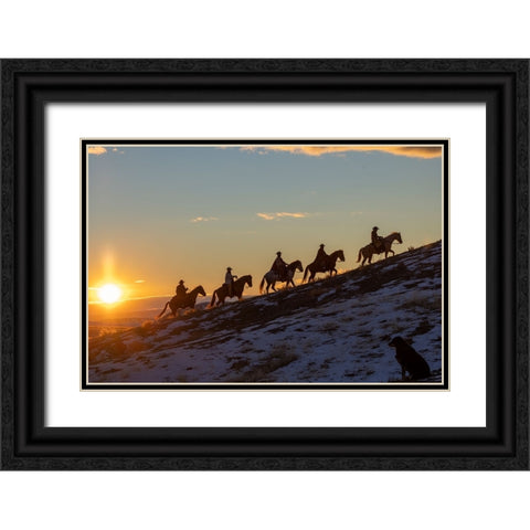 USA- Wyoming. Hideout Horse Ranch- wranglers on horseback in snow at sunset. Black Ornate Wood Framed Art Print with Double Matting by Looney, Hollice