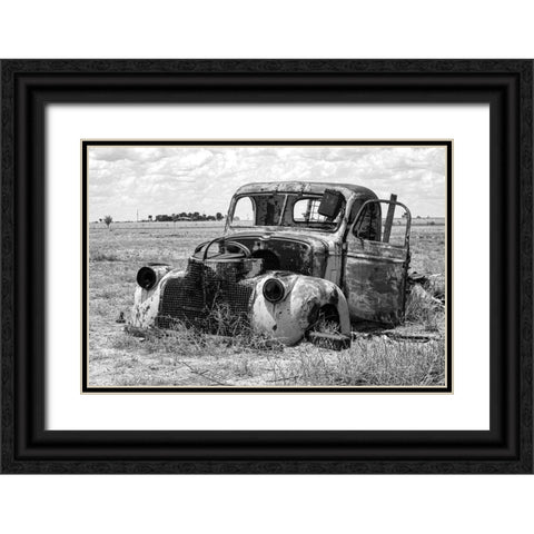 Vintage Car in Field Black Ornate Wood Framed Art Print with Double Matting by Vintage Photo Archive