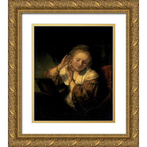 Young Woman Trying Earrings, 1654 Gold Ornate Wood Framed Art Print with Double Matting by Rembrandt