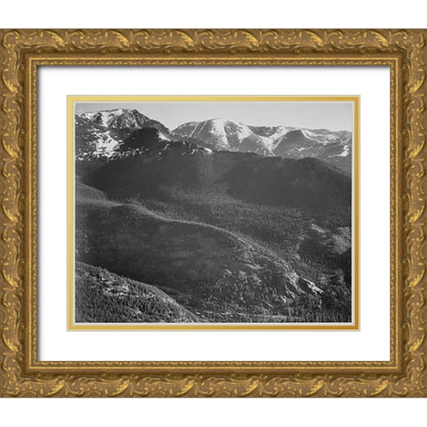 View of wooded hills with mountains in background, in Rocky Mountain National Park, Colorado, ca. 19 Gold Ornate Wood Framed Art Print with Double Matting by Adams, Ansel