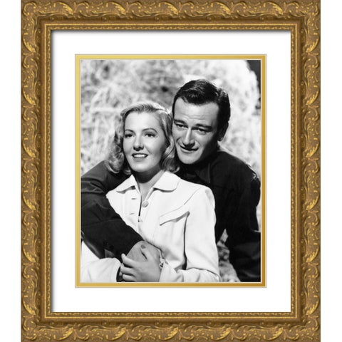 John Wayne with Jean Arthur Gold Ornate Wood Framed Art Print with Double Matting by Hollywood Photo Archive