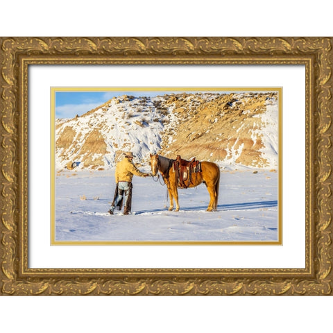 USA- Wyoming. Hideout Horse Ranch- wrangler and horse in snow. Gold Ornate Wood Framed Art Print with Double Matting by Looney, Hollice