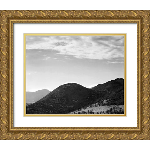 View of hill with trees, clouded sky, in Rocky Mountain National Park, Colorado, ca. 1941-1942 Gold Ornate Wood Framed Art Print with Double Matting by Adams, Ansel