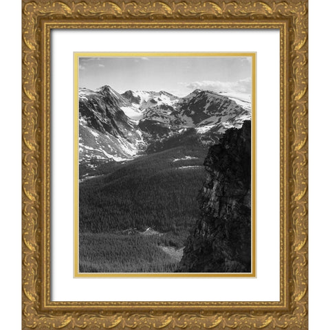 View of snow-capped mountain timbered area below, in Rocky Mountain National Park, Colorado, ca. 194 Gold Ornate Wood Framed Art Print with Double Matting by Adams, Ansel