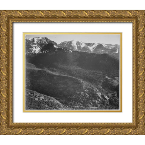 View of wooded hills with mountains in background, in Rocky Mountain National Park, Colorado, ca. 19 Gold Ornate Wood Framed Art Print with Double Matting by Adams, Ansel