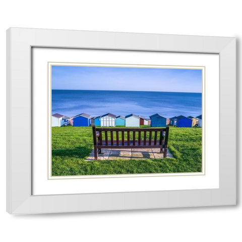 Bench on lawn with beach huts in background White Modern Wood Framed Art Print with Double Matting by Frank, Assaf