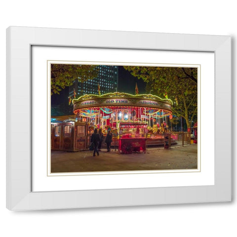 Spinning carousel at night in garden, London, UK White Modern Wood Framed Art Print with Double Matting by Frank, Assaf