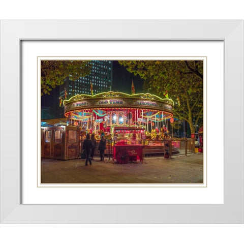 Spinning carousel at night in garden, London, UK White Modern Wood Framed Art Print with Double Matting by Frank, Assaf