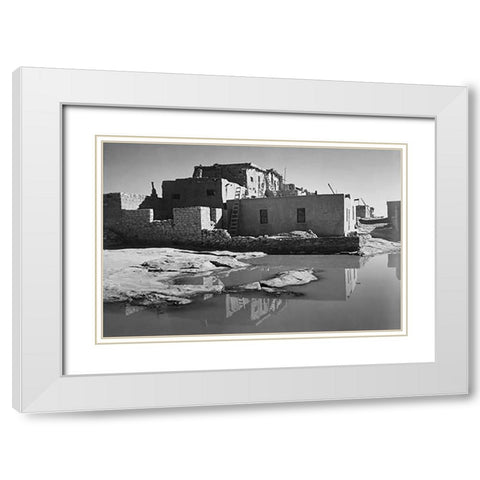 Adobe House with Water in Foreground - Acoma Pueblo, New Mexico - National Parks and Monuments, ca. White Modern Wood Framed Art Print with Double Matting by Adams, Ansel