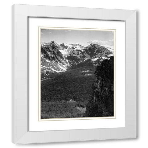 View of snow-capped mountain timbered area below, in Rocky Mountain National Park, Colorado, ca. 194 White Modern Wood Framed Art Print with Double Matting by Adams, Ansel