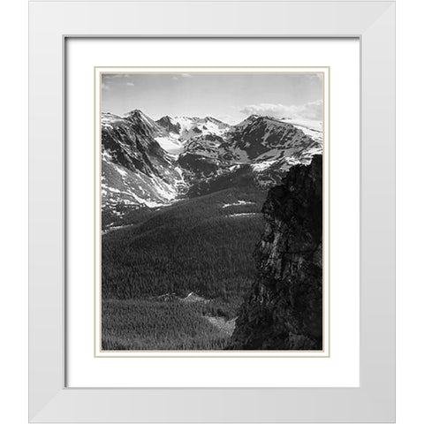 View of snow-capped mountain timbered area below, in Rocky Mountain National Park, Colorado, ca. 194 White Modern Wood Framed Art Print with Double Matting by Adams, Ansel
