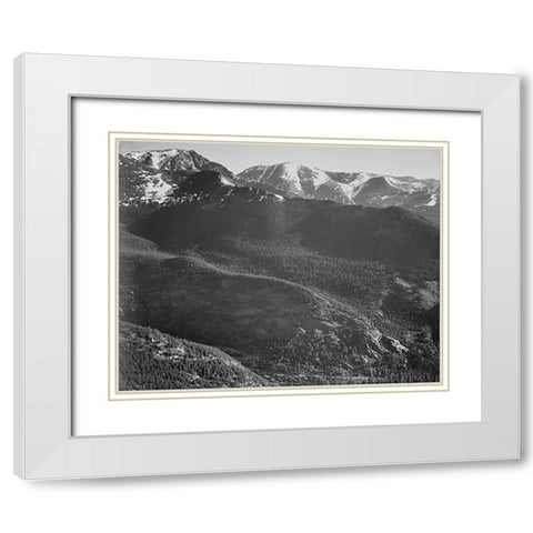 View of wooded hills with mountains in background, in Rocky Mountain National Park, Colorado, ca. 19 White Modern Wood Framed Art Print with Double Matting by Adams, Ansel